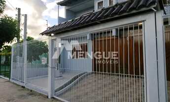 Imagem 2: Casa com 3 dormitórios, sedo 2 suítes e 2 vagas à venda no bairro Rubem Berta em Porto A