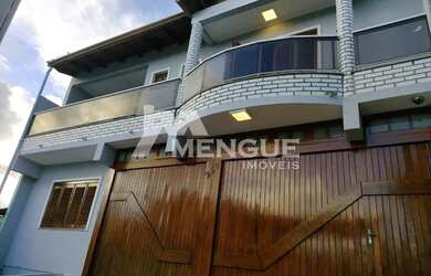 Imagem 3: Casa com 3 dormitórios, sedo 2 suítes e 2 vagas à venda no bairro Rubem Berta em Porto A