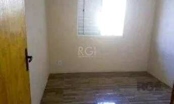 Imagem 7: Vende terreno 300m², com 3 casas, casa da frente 2 dormitórios, sobrado nos fundos parte d