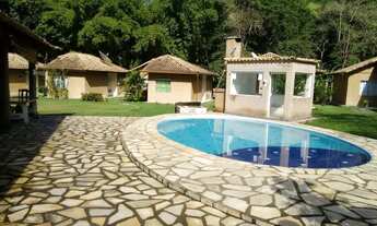 Imagem: Casa na serra, beira rio