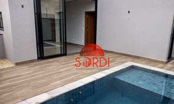 Imagem 2: Ótima casa com 3 suites e piscina em condominio