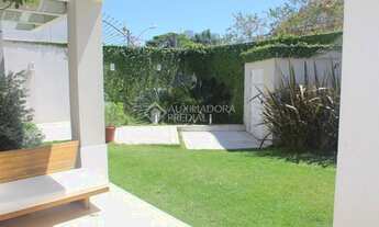 Imagem 3: Casa para venda tem 570 metros quadrados com 4 quartos em Três Figueiras - Porto Alegre