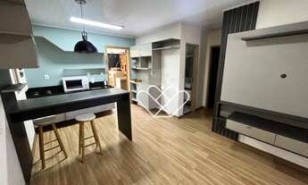 Imagem 2: Casa com 2 Dormitórios, Área de Lazer com Churrasqueira e Lareira: Conforto e Estilo para