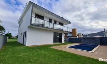 Imagem 3: Casa de condomínio para venda possui 245 metros quadrados com 4 quartos