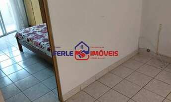 Imagem 11: Sala Living com garagem na praia