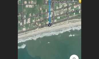 Imagem: Lote a venda com uma residência de madeira