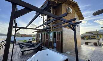 Imagem 4: Casa pé na areia na Praia do Campeche com 2 dormitórios