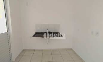 Imagem 5: Casa com 2 dormitórios para alugar, 107 m² por R$ 1.050,00/mês - Jardim Califórnia - Uberl