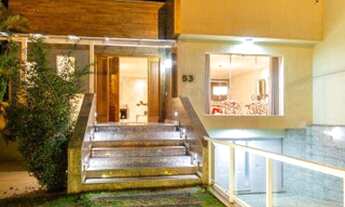 Imagem 5: Casa em condomínio 558m², 4 suítes, elevador panorâmico, piscina e muito mais