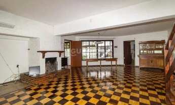 Imagem 3: Casa Residencial com 4 dormitórios, sendo 1 suíte, e 3 vagas de garagem no bairro Tristeza