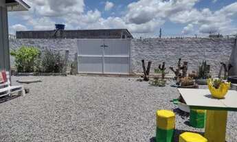 Imagem 6: Troco terreno, com casa de madeira na Palhoça