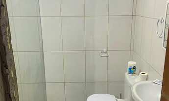 Imagem 5: Casa aconchegante com varanda e quintal