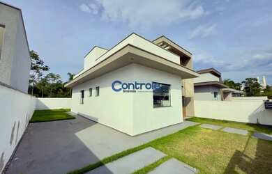 Imagem 2: Casa unifamiliar com 3 dormitórios, sendo 1 suíte, e amplo quintal