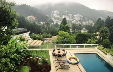 Imagem: Casa com 4 suítes à venda, 1054 m² por