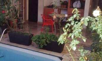 Imagem 4: Sobrado com 3 suítes 1 master closet sacada 2 vagas piscina área gourmet à venda por R$ 98