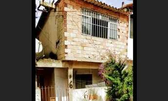 Imagem 3: Vendo um terreno com 4 casas