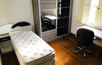 Imagem 3: Quarto individual com mobília