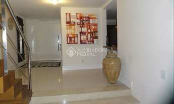 Imagem 6: Casa para venda tem 570 metros quadrados com 4 quartos em Três Figueiras - Porto Alegre