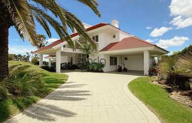 Imagem 3: Casa de alto padrão à venda com 04 suítes e piscina no Condomínio Green Village, em Xangri