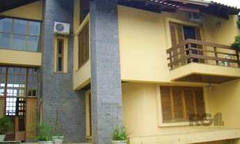 Imagem 1: Casa de 370m² - 4 dormitórios, 2 suítes e 4 vagas de garagem no bairro Espírito Santo