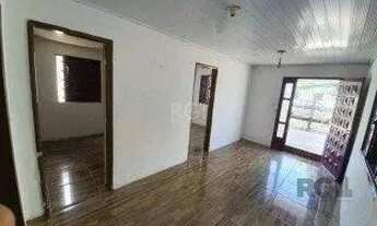 Imagem 6: Vende terreno 300m², com 3 casas, casa da frente 2 dormitórios, sobrado nos fundos parte d