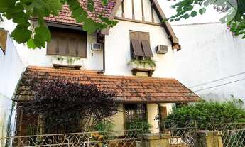 Imagem 2: Casa histórica preservada no coração do Jardim Botânico à venda, com área total de 396 m²