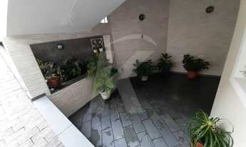 Imagem 6: Casa com 242 m2 de área construída, 3 quartos, sendo 1 suíte, quintal e 6 vagas na Vila Gu