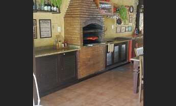 Imagem 6: Casa de condomínio para aluguel tem 465 metros quadrados com 6 quartos