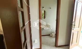 Imagem 7: CASA EM FLORIANÓPOLIS, VISTA PARCIAL PARA O MAR, 03 DORMITÓRIOS, 01 SUÍTE, 02 VAGAS DE GAR