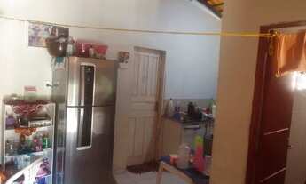 Imagem 3: Vende se uma casa na zona leste.na Árvores verdes próximo a caixa d'água