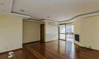 Imagem 2: Vende-se excelente apartamento 3 quartos c/ suíte, 2 vagas, living com lareira, sacada e c