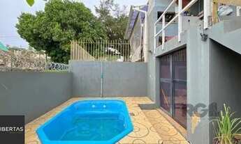 Imagem 2: Casa Condominio em Porto Alegre, no bairro Campo Novo, com 3 dormitório(s), e 3