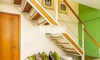 Imagem 7: Apartamento duplex com dois dormitórios, dois banheiros e uma vaga de garagem no bairro Au