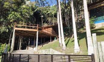 Imagem 5: Casa de praia com terreno grande em meio à natureza