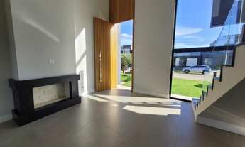 Imagem 2: Casa de condomínio para venda com 240 metros quadrados com 5 quartos em Centro - Xangri-Lá