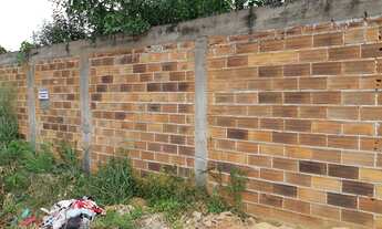 Imagem 6: Lote Jardim Nova Era 400,79 m2 murado portão fechado e aterrado escorrido para frente asfa