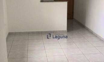 Imagem 2: Apartamento com 2 dormitórios para alugar por R$ 1.300/mês - Jardim das Maravilhas - Santo