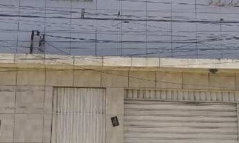 Imagem 3: Prédio comercial + 2 casas