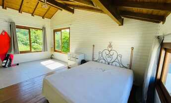 Imagem 3: Belo imóvel à venda com 110m2, a caminho da Praia da Barra de Ibiraquera, com 2 casas no e