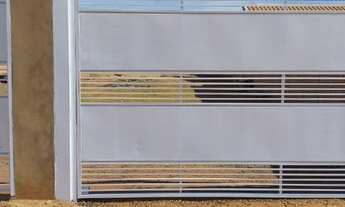 Imagem 2: Terreno 10x25, murado, com portão de elevação, padrão e pronto para construir