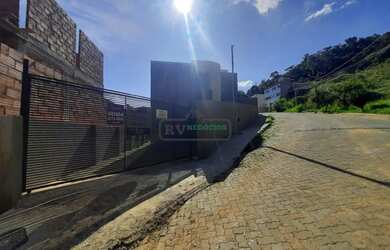 Imagem 2: Casa para venda tem 125 metros quadrados com 3 quartos em Lourdes - Juiz de Fora - MG