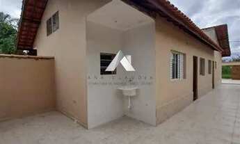 Imagem 4: 2 Quartos, sendo 1 suíte Sala Cozinha Área de serviços 2 Vagas de Garagem c