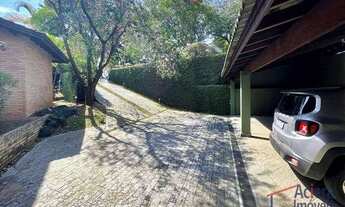 Imagem 3: Linda casa rústica integrada e avarandada com detalhes em tijolos aparentes, total privaci