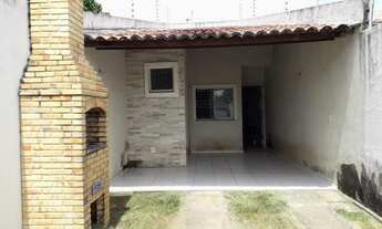 Imagem: Uma graça de casa plana recuada, com varanda