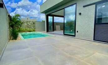 Imagem 6: Casa de condomínio para venda possui 318 metros quadrados com 4 quartos