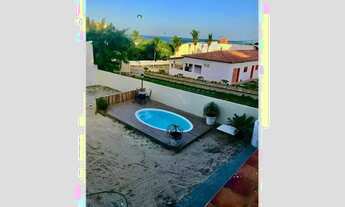 Imagem 6: Casa paralela a beira mar da Praia de Pirangi