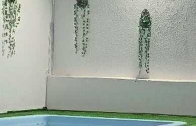 Imagem 2: Casa Moderna com Piscina e Conforto