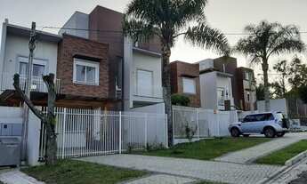 Imagem 2: Sobrado em condomínio, com 3 quartos, sendo 1 suíte à venda, 114 m² por R$ 698.000 - Campo