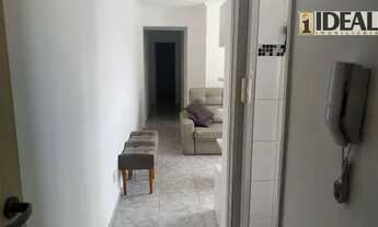 Imagem 7: 2 dormitórios mobiliado no Embaré, vista livre, rico em armários, garagem demarcada, prédi