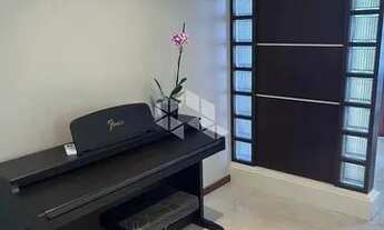 Imagem 5: CASA EM FLORIANÓPOLIS, VISTA PARCIAL PARA O MAR, 03 DORMITÓRIOS, 01 SUÍTE, 02 VAGAS DE GAR